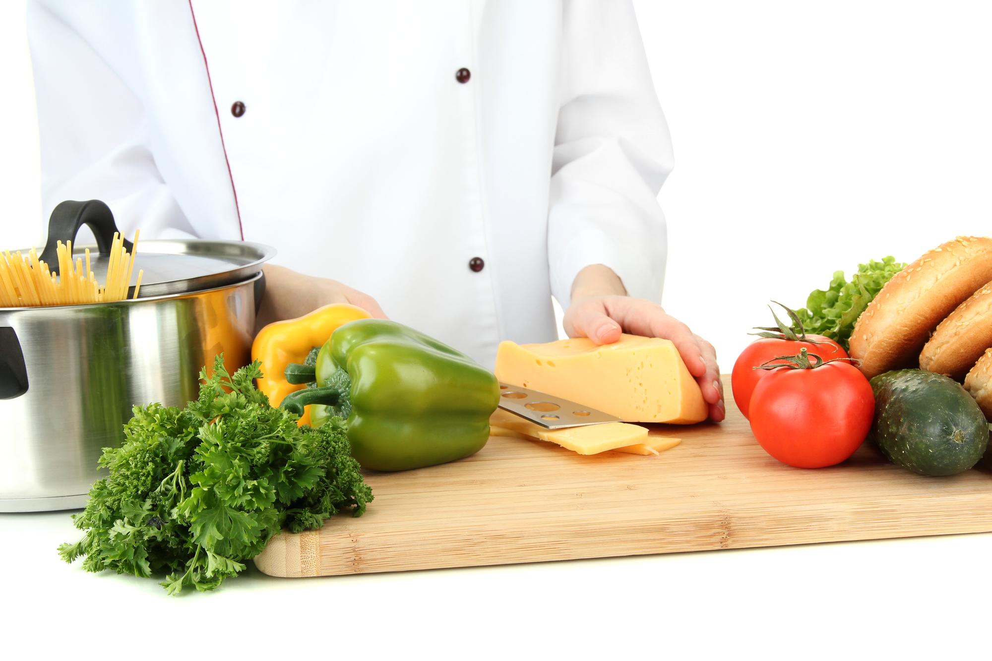 Cook preparing ingredients in warm studio